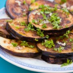 fried aubergines (eggplant) with freshly grated garlick and parsley